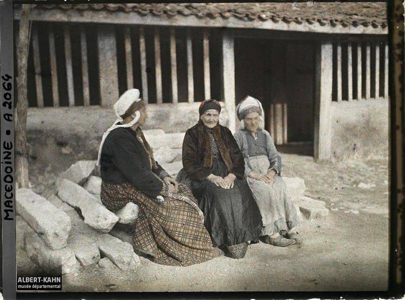 three women sitting down