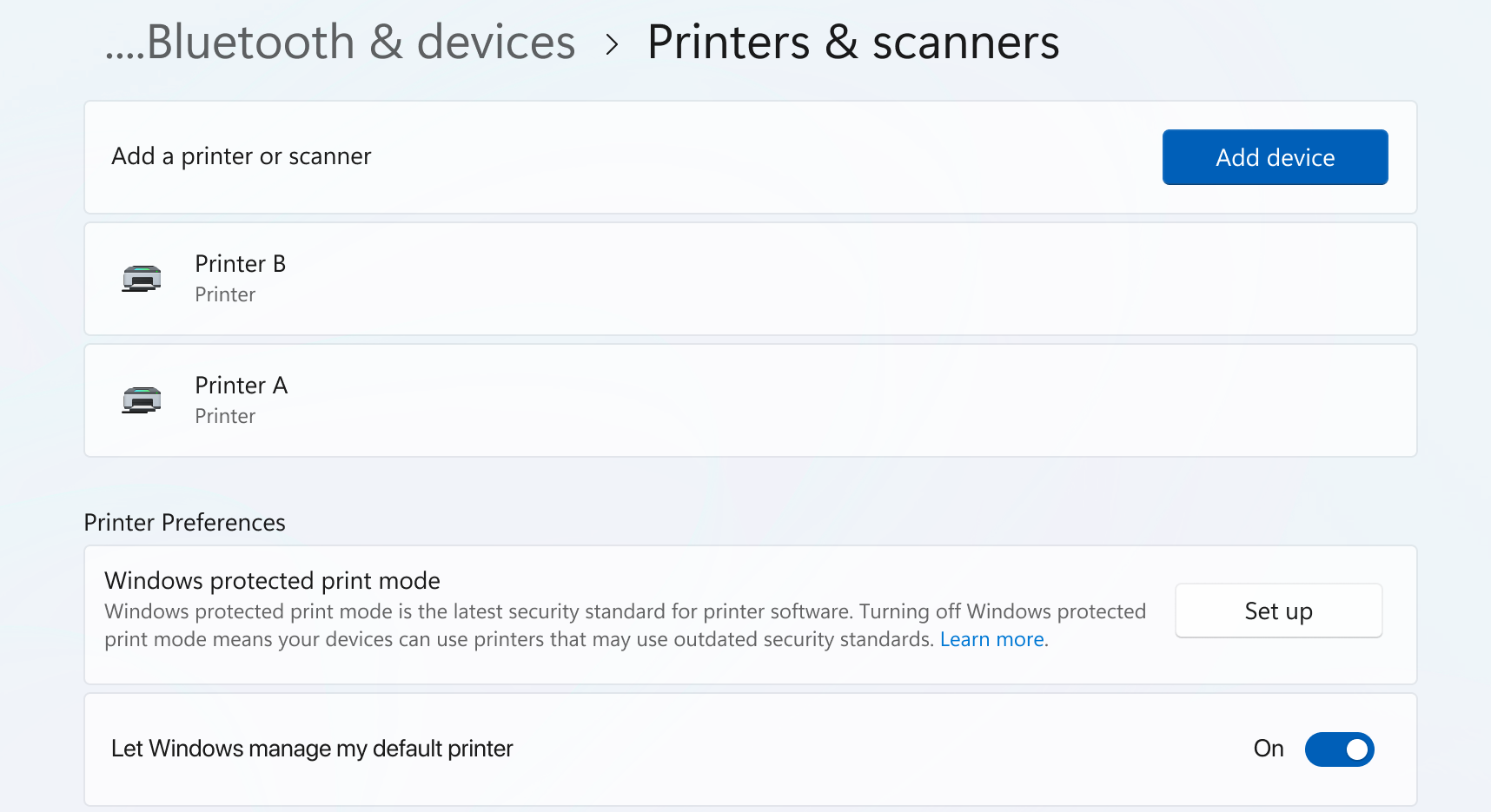 Printer Offline but Connected? Fix It on Windows 11 2 Official Microsoft Windows 11 Printers and scanners screenshot showing the Windows protected print mode setting